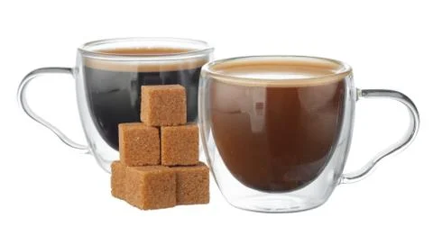 Glass cup of coffee and stack of sugar cubes isolated on white 스톡 사진