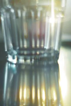 Glass cup reflection Stock Photos