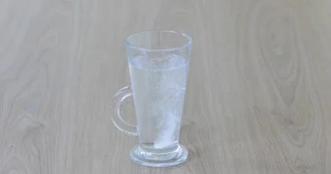 In a glass cup, the tablet quickly dissolves. Stock Footage 150233943