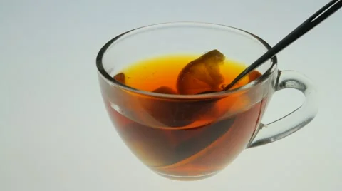 Glass cup with tea Stock Footage 60434767