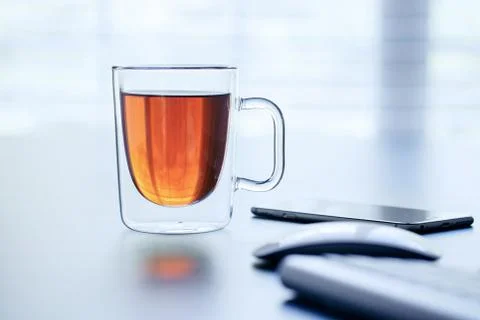 Glass Cup of Tea on a Table Stock Photos