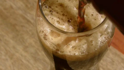 Glass of dark beer Stockbeeldmateriaal 91623125