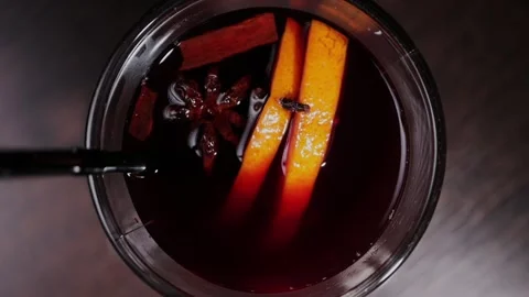A glass of delicious mulled wine on the table Stock Footage 329090974