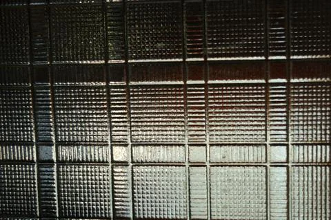 Glass dented background in the form of square wafers, squares and direct reliefs Foto stock