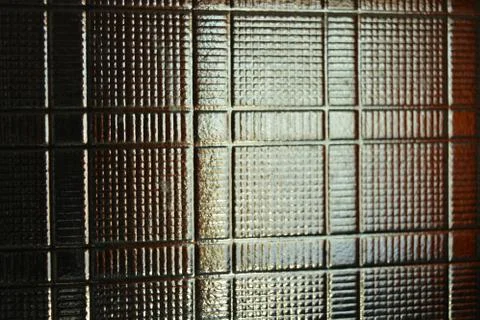 Glass dented background in the form of square wafers, squares and direct reliefs Foto stock
