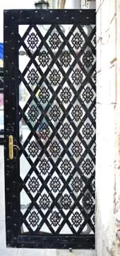 Glass door with eastern pattern Stock Photos