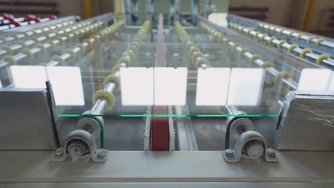 Glass for double glazed windows moves on the machine Stock Footage 102337322