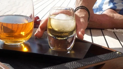 A glass of drink and very nice sky together Stock Footage 128925227