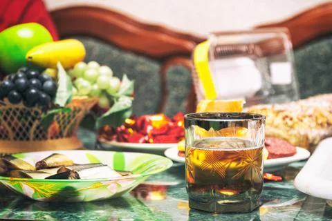 A glass of drink on the table with fruit Stock Photos