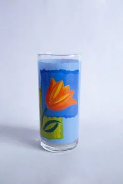 Glass for drinks with patterns of flowers Stock Photos