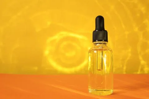 Glass dropper bottle with a pippette Stock Photos