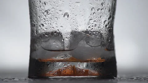 A glass in drops of water Stock Footage 171994809