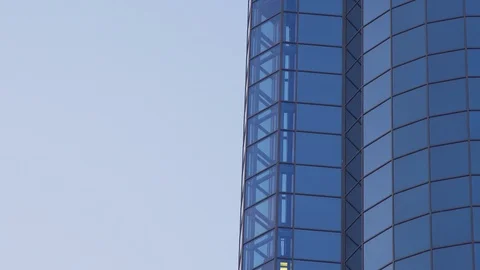 Glass Elevator Going Up the Glazed Facade Stock Footage 114779606