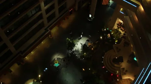 Glass Elevator at Night - Moving Down, Overlooking Hotel Lobby Stock Footage 58337500