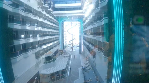 A glass elevator rises to the deck Europe Cruise Ship Video stock 319589113