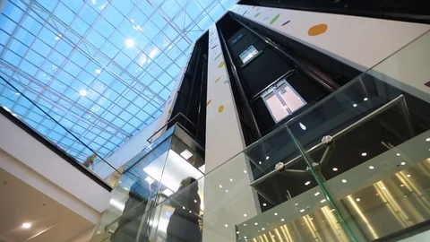 Glass elevators in shopping Mall Stock Footage 73855360