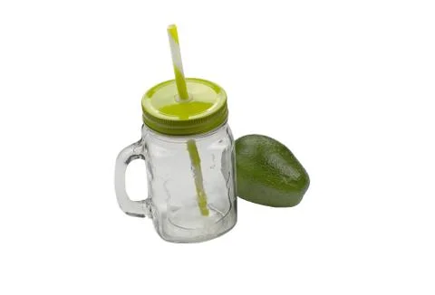 Glass empty jar, mug with a green cover, handle and straw isolated on white Stock Photos