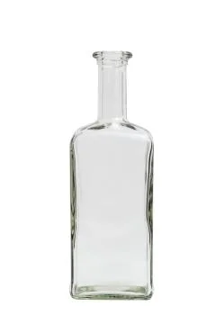 Glass empty square bottle on isolated background. Stock Photos