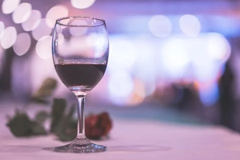 Glass of expensive wine at a luxurious dinner. Stock Photos
