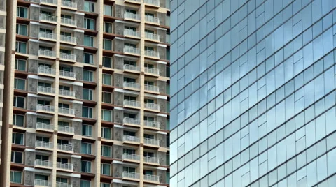 Glass facade of modern office building with condominium on background Stock Footage 43271940