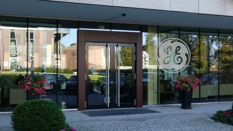 Glass facade of a modern office building with General Electric logo. Editorial Stock Footage 80657680