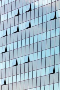 Glass facade with opened windows Stock Photos
