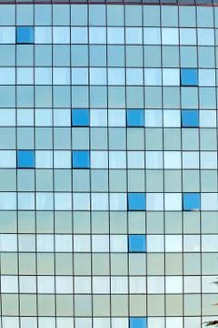 Glass facade with opened windows Stock Photos