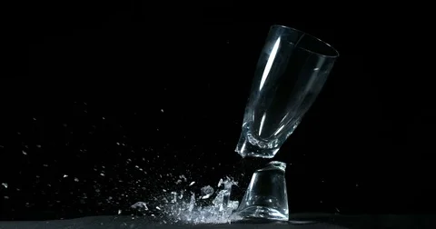 Glass Falling and exploding on Black Background, Slow Motion 4K Stock Footage 75980859