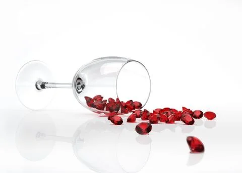 Glass felt down, with many red diamonds came out of it, instead of the wine. Stock Illustration