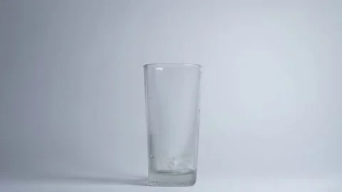 Glass filled with ice cubes Stock Footage 228772217
