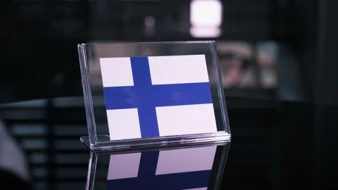 Glass Finland Flag Rotating On Table 動画素材 208490170