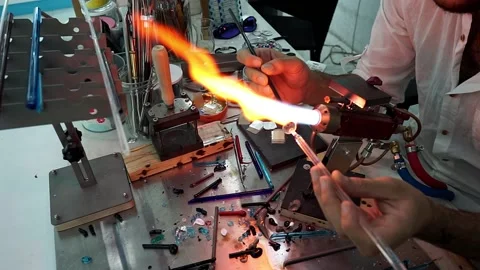 Glass forming in flame Stock Footage 147737131