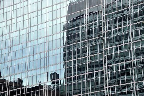 Glass front of New York City Skyscraper Stock Photos