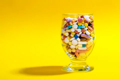 Glass Full of Pills Stock Photos