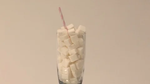A glass full of sugar Stock Footage 117035857
