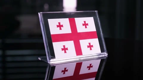 Glass Georgia Flag Rotating On Table 動画素材 208492471