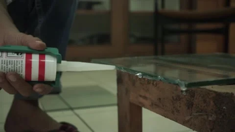 Glass glue installation try Stock Footage 309445853