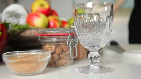 Glass goblet on a kitchen Stock Footage 88804387