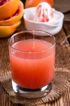 Glass with Grapefruit Juice Stock Photos