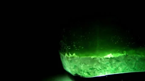 Glass with green liquid Stock Footage 68659332