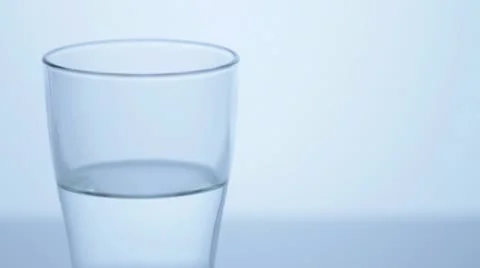 Glass half full left, close 1 Stock Footage 11611132