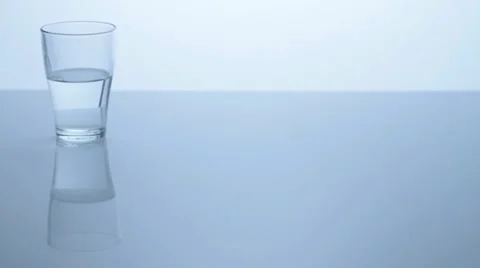 Glass half full left, more background Video stock 11611135
