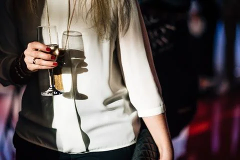 Glass in hand Stock Photos