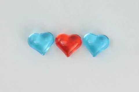 Glass hearts on a withe background. Valentines day. Place for text. Stock Photos