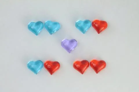 Glass hearts on a withe background. Valentines day. Place for text. Stock Photos