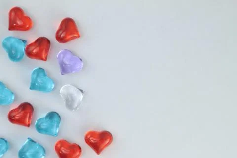 Glass hearts on a withe background. Valentines day. Place for text. Foto stock
