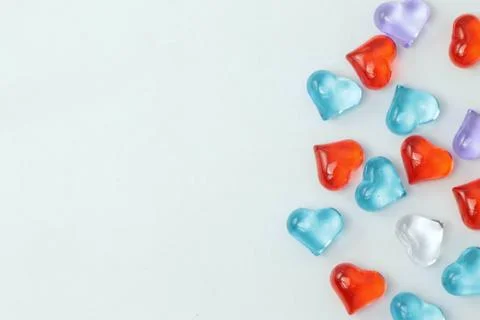 Glass hearts on a withe background. Valentines day. Place for text. Foto stock