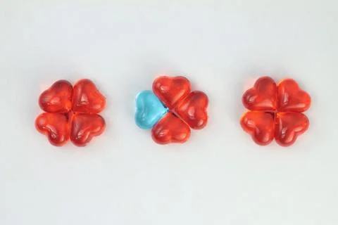 Glass hearts on a withe background. Valentines day. Place for text. Stock Photos