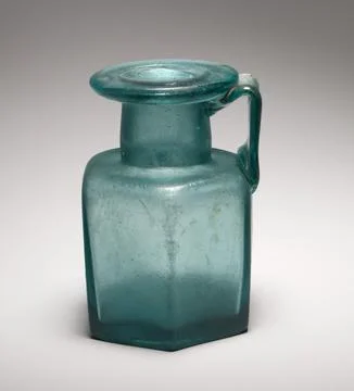 Glass hexagonal bottle 2nd half of 1st3rd century A.D. Roman Translucent de.. Stock Photos