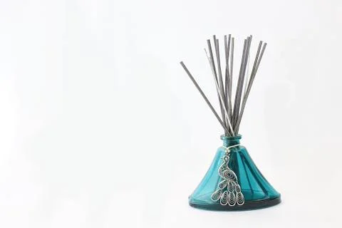 Glass home decor incense diffuser with peacock pendant Stock Photos
